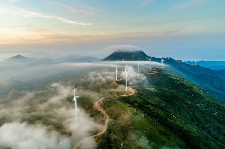 Cloudy mountain wind turbines